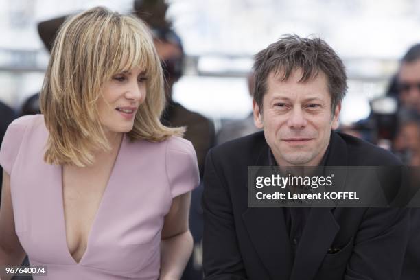 Actors Emmanuelle Seigner and Mathieu Amalric attend the photocall for 'La Venus A La Fourrure' at The 66th Annual Cannes Film Festival at the Palais...