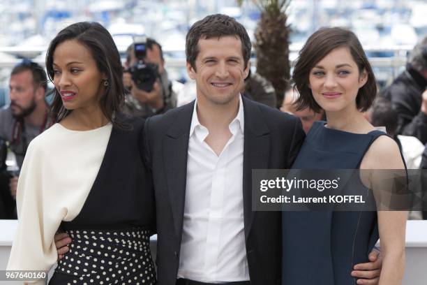 Zoe Saldana, Director Guillaume Canet and Marion Cotillard attend the photocall for 'Blood Ties' during the 66th Annual Cannes Film Festival at the...