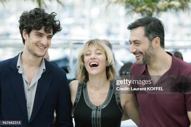 Actor Filippo Timi, director Valeria Bruni Tedeschi and actor Louis Garrel attend the photocall for 'Un Chateau En Italie' during The 66th Annual...