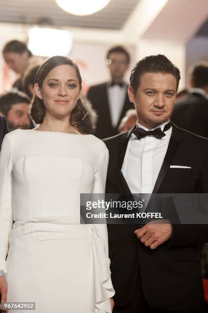 Marion Cotillard and Jeremy Renner attend 'The Immigrant' Premiere during the 66th Annual Cannes Film Festival at Palais des Festivals on May 24,...