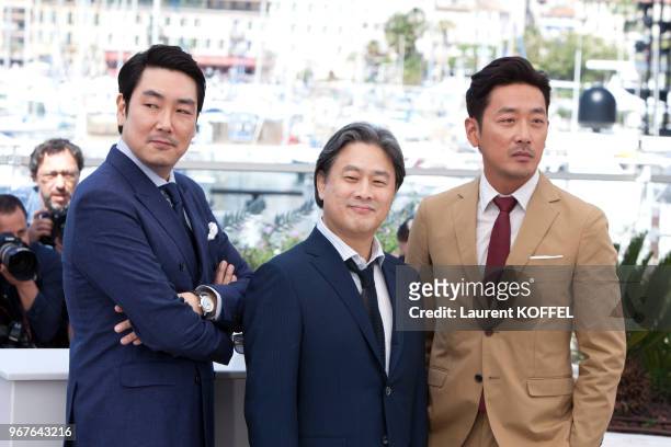 Actor Cho Jin-Woong, director Park Chan-Wook and actor Ha Jung-Woo attend 'The Handmaiden ' photocall during the 69th annual Cannes Film Festival at...