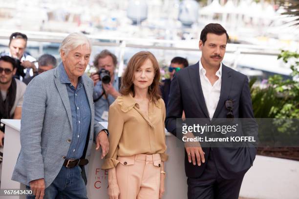 Paul Verhoeven, Isabelle Huppert and Laurent Lafitte attend the 'Elle' Photocall during the 69th annual Cannes Film Festival at the Palais des...