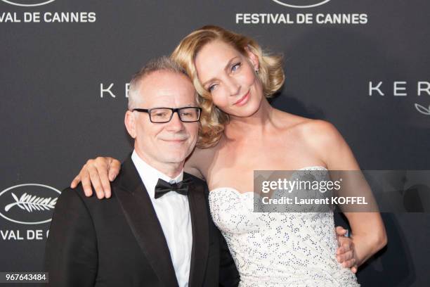 Uma Thurman and Thierry Fremaux attend the Women in Motion Awards Dinner at the 70th Cannes Film Festival at Place de la Castre on May 21, 2017 in...