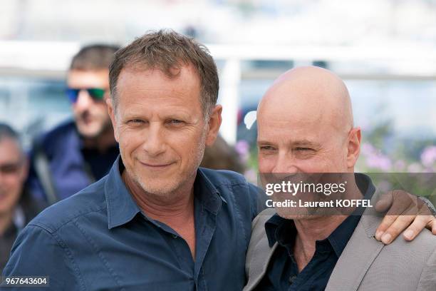Charles Berling and Christian Berkel attend the 'Elle' Photocall during the 69th annual Cannes Film Festival at the Palais des Festivals on May 21,...