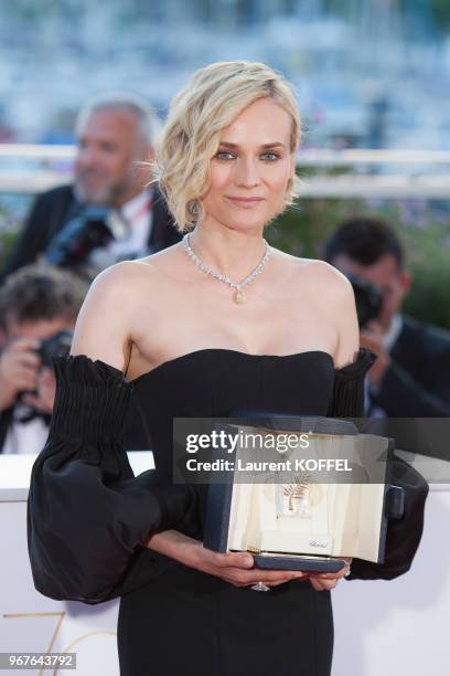 Actress Diane Kruger, who won the award for best actress for her part in the movie 'In The Fade' , attends the Palme D'Or Winner Photocall during the...