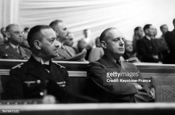 Amiral Räder et le ministre des Affaires Etrangères du reich Joachim von Ribbentrop écoutent le discours du Führer lors de la session du Reichstag le...