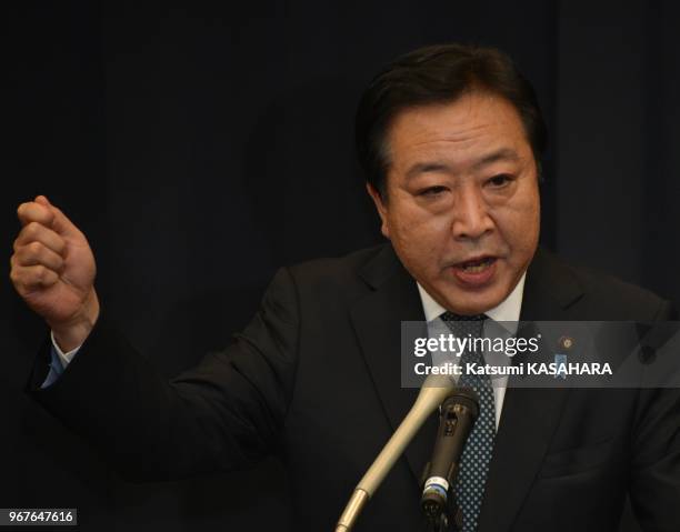 Japan's prime minister Yoshihiko Noda gives apep talk to his party members for the comming general election on November 16, 2012 in Tokyo, Japan.