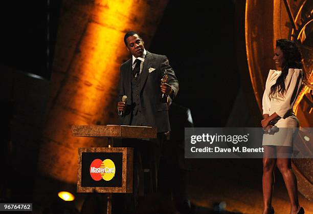 Jay-Z receives the International Male Solo Artist Award presented by Melanie Brown on stage during The Brit Awards 2010, at Earls Court One on...