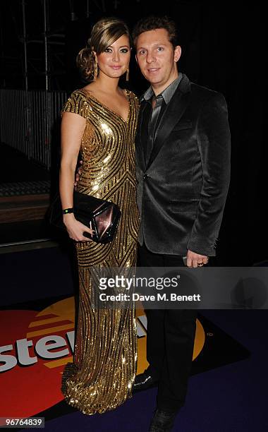 Holly Valance and Nick Candy arrive at The Brit Awards 2010, at Earls Court One on February 16, 2010 in London, England.