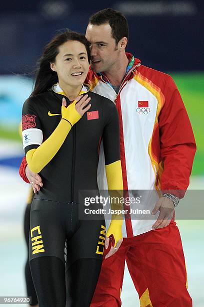 Wang Beixing of China reacts with her coach after winning the bronze during the women's speed skating 500 m on day five of the Vancouver 2010 Winter...