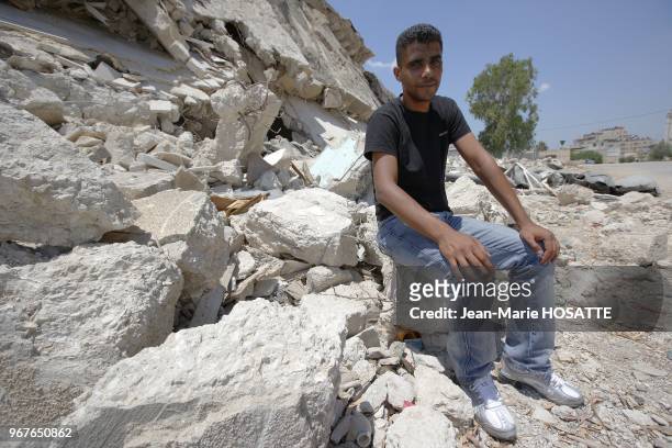 Zubeidi sits in the ruins of Jenine's Moqata, a symbol of the palestinian power, destroyed by Israel in 2002. He has no rights to leave this ruin...