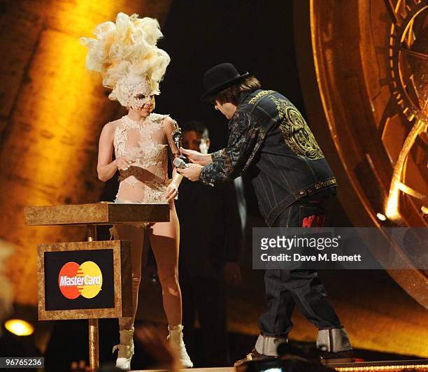 Lady Gaga receives the International Female Solo Artist presented by Jonathan Ross on stage during The Brit Awards 2010 at Earls Court One on...