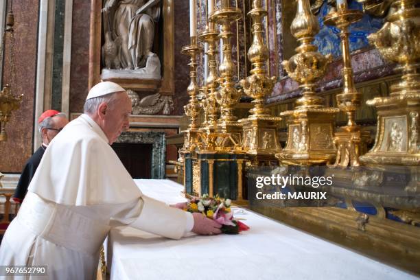 Pope Francis opened his first morning on March 14, 2013 as pontiff by praying at Rome's Santa Maria Maggiore basilica dedicated to the Virgin Mary, a...