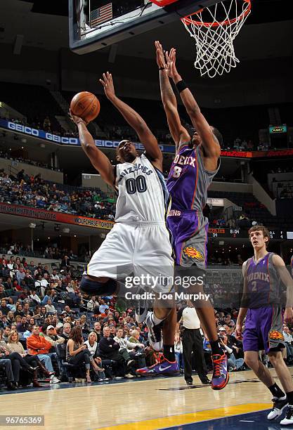 Darrell Arthur of the Memphis Grizzlies shoots against Channing Frye of the Phoenix Suns on February 16, 2010 at FedExForum in Memphis, Tennessee....