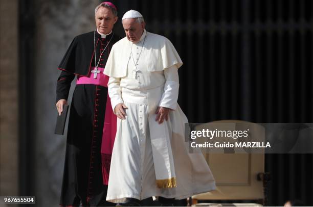 Pope Francis and Georg Ganswein attend the weekly general audience on October 23, 2013 on Saint Peter's Square at the Vatican.