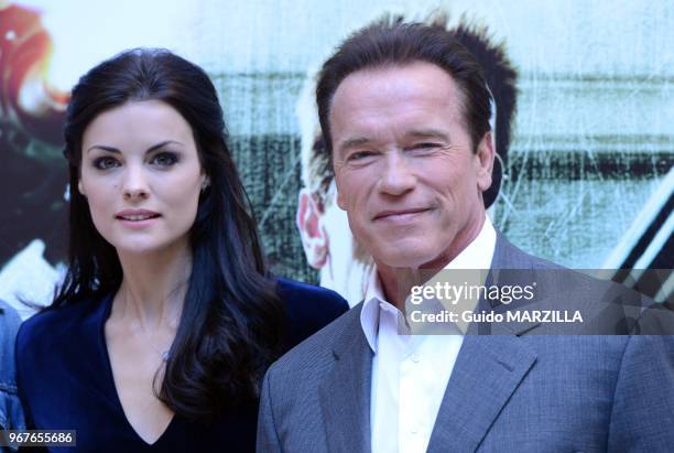 Actors Jamie Alexander and Arnold Schwarzenegger pose during the 'The Last Stand' photocall on January 25, 2013 in Rome, Italy.