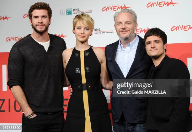 Liam Hemsworth, Jennifer Lawrence, director Francis Lawrence and Josh Hutcherson attend the 'The Hunger Games: Catching Fire' Photocall during the...