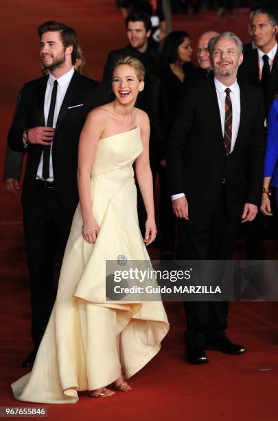 Liam Hemsworth, Jennifer Lawrence and director Francis Lawrence arrive at the 'The Hunger Games: Catching Fire' Premiere during the 8th Rome Film...