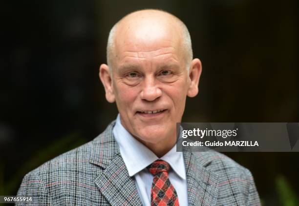 Actor John Malkovich poses during the film 'Educazione Siberiana' photocall on February 22, 2013 in Rome, Italy.