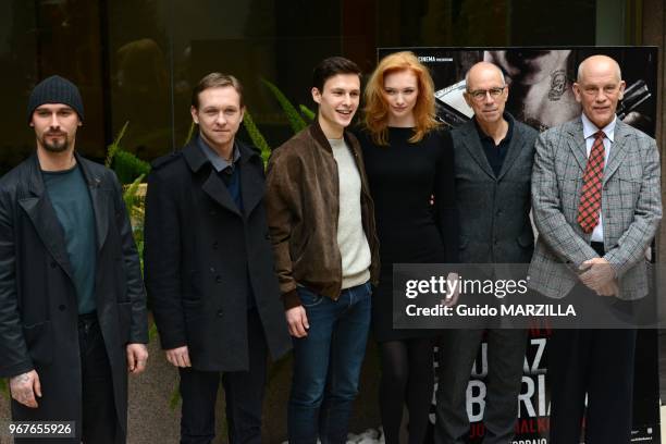 Writer Nicolai Lilin, actors Vilius Tumalavicius, Arnas Fedaravicius, Eleanor Tomlinson, director Gabriele Salvatores and actor John Malkovich pose...