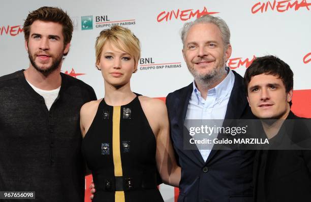 Liam Hemsworth, Jennifer Lawrence, director Francis Lawrence and Josh Hutcherson attend the 'The Hunger Games: Catching Fire' Photocall during the...