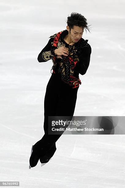 Daisuke Takahashi of Japan competes in the men's figure skating short program on day 5 of the Vancouver 2010 Winter Olympics at the Pacific Coliseum...