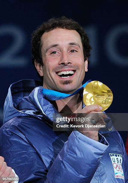 Seth Wescott of the United States celebrates winning the gold medal during the medal ceremony the Men's Snowboard Cross on day 5 of the Vancouver...