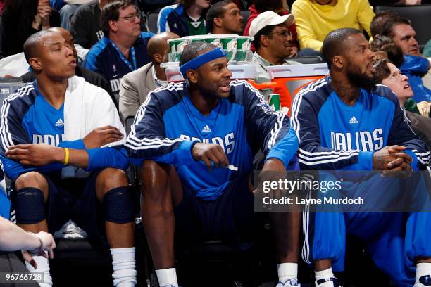 The newest members to the Dallas Mavericks team, Caron Butler, Brendan Haywood, and DeShawn Stevenson watch the game against the Oklahoma City...