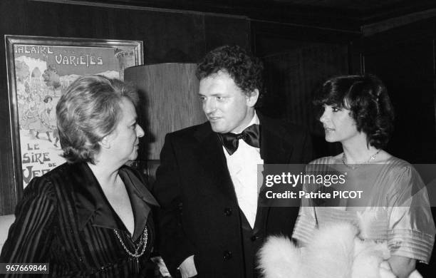 Jacqueline Maillan, Jacques Martin et Danièle Evenou lors d'une soirée le 23 février 1977 à Paris, France.