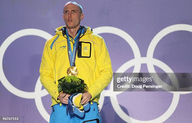 Bjorn Ferry of Sweden celebrates winning the gold medal during the medal ceremony for the Men's Biathlon 12.5km Pursuit on day 5 of the Vancouver...