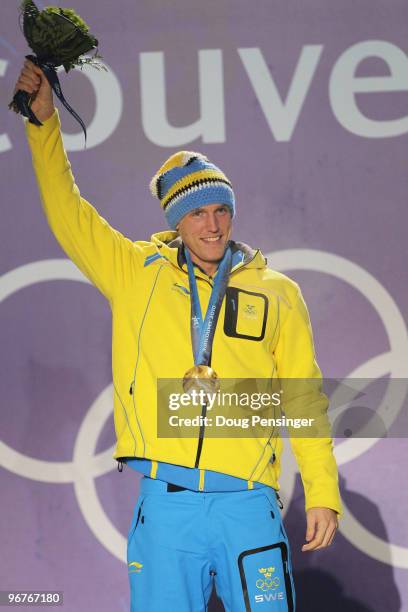 Bjorn Ferry of Sweden celebrates winning the gold medal during the medal ceremony for the Men's Biathlon 12.5km Pursuit on day 5 of the Vancouver...