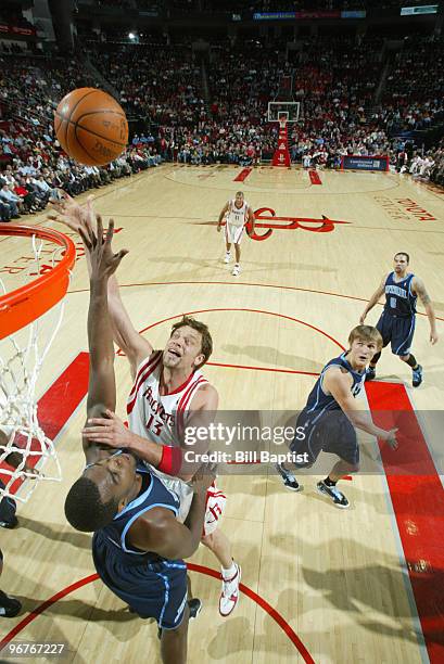 David Anderson of the Houston Rockets shoots the ball over Paul Millsap of the Utah Jazz on February 16, 2010 at the Toyota Center in Houston, Texas....