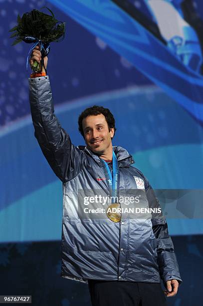 Gold medalist Seth Wescott of the US poses during the medal ceremony of the men's Snowboard SBX at the BC Place on February 16, 2010 during the...