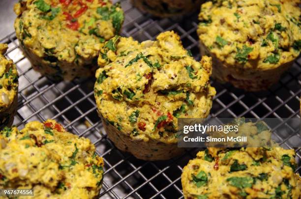 homemade kale, sun dried tomato and feta cheese muffins - savoury food stock pictures, royalty-free photos & images