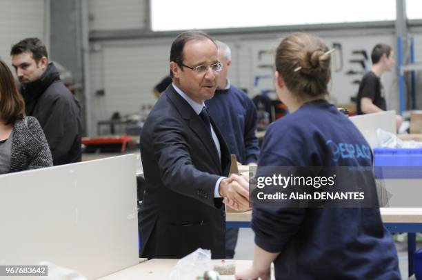 French Socialist Party candidate for the 2012 presidential election Francois Hollande visits E.S.P.A.C.E a plant of aircraft parts maker who works...