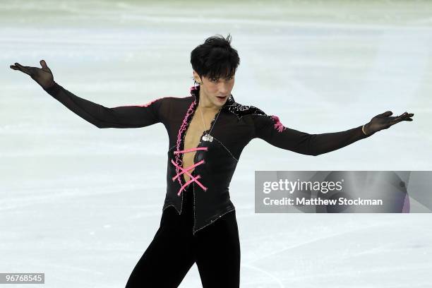 Johnny Weir of the United States reacts after his routine in the men's figure skating short program on day 5 of the Vancouver 2010 Winter Olympics at...