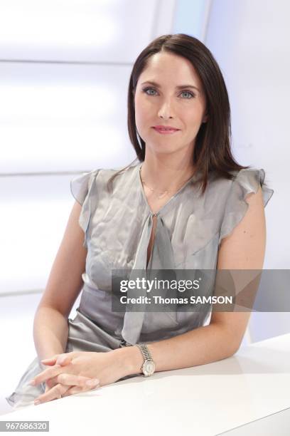 Portrait of French broadcaster Clelie Mathias, on the set of her TV news programme 'Le Nouveau Journal' for Direct 8 Channel in Puteaux, France on...