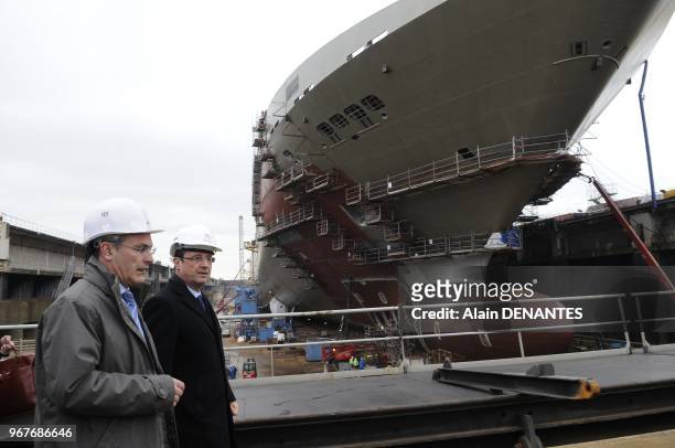 French Socialist Party candidate for the 2012 presidential election Francois Hollande visits the STX shipyard, as part of the campaign, in...