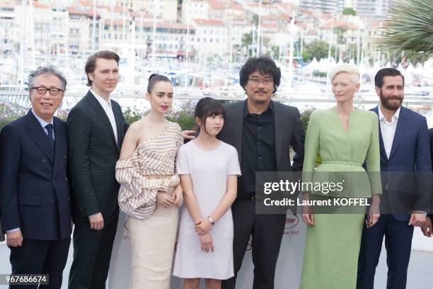 Byung Heebong, Paul Dano, Lily Collins, director Bong Joon-Ho, actors Tilda Swinton and Jake Gyllenhaal attend the 'Okja' photocall during the 70th...