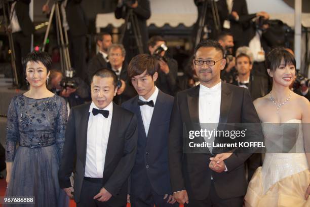 Actress Tao Zhao, director Jia Zhangke, actors Lanshan Luo and Jiang Wu, actress Meng Li attend the Premiere of 'Tian Zhu Ding' during The 66th...