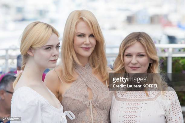 Actresses Elle Fanning, Nicole Kidman and Kirsten Dunst attend 'The Beguiled' photocall during the 70th annual Cannes Film Festival at Palais des...