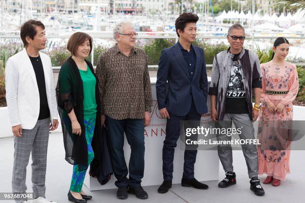 Producer Hiroyoshi Koiwai, director Takashi Miike, producer Jeremy Thomas, actor Takuya Kimura and actress Hana Sugisaki attend the 'Blade Of The...