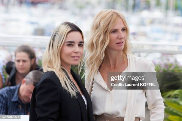 Elodie Bouchez and Sandrine Kiberlain attend Jury Camera D'Or Photocall during the 70th annual Cannes Film Festival at Palais des Festivals on May...