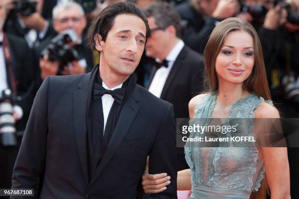 Adrien Brody with Lara Lieto attends the 70th Anniversary of the 70th annual Cannes Film Festival at Palais des Festivals on May 23, 2017 in Cannes,...