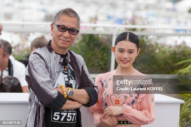 Director Takashi Miike and actress Hana Sugisaki attend the 'Blade Of The Immortal ' photocall during the 70th annual Cannes Film Festival at Palais...