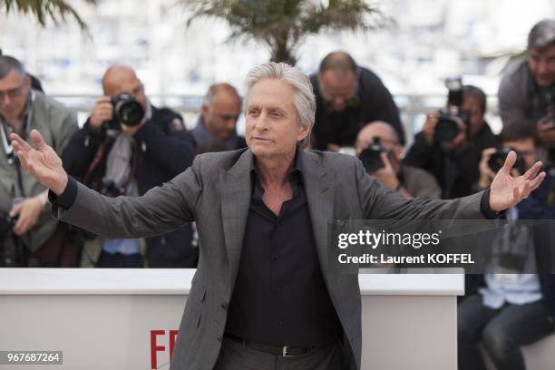 Michael Douglas attends the photocall for 'Behind the Candelabra' during the 66th Annual Cannes Film Festival at Palais des Festivals on May 21, 2013...