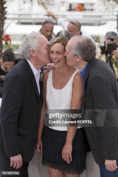 Cecile de France, Jean Pierre, Luc Dardenne pose at the "Le Gamin Au Velo" Portrait Session during the 64th Annual Cannes Film Festival on May 14,...