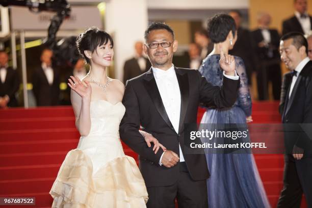 Actress Meng Li and actor Jiang Wu attend the Premiere of 'Tian Zhu Ding' during The 66th Annual Cannes Film Festival at Palais des Festivals on May...