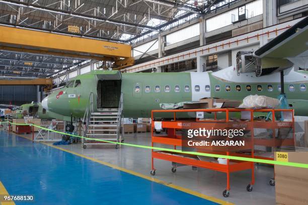 French Minister for Foreign Trade, Nicole Bricq, visits ATR's Final Assembly Line in Toulouse on February 22, 2013;Accompanied by Martin Malvy,...