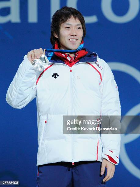 Keiichiro Nagashima of Japan celebrates winning the silver medal during the medal cermony for the Men's 500m Speed Skating on day 5 of the Vancouver...